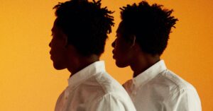 Afro twins with yellow background
