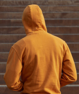 Man in a orange hoodie