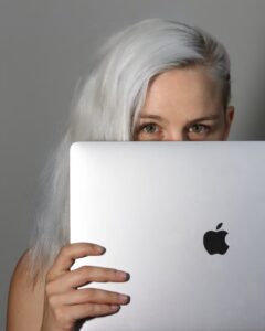 Anna Hadnagy with MacBook