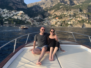 Emily and her husband, Alex, visiting Positano, Italy.
